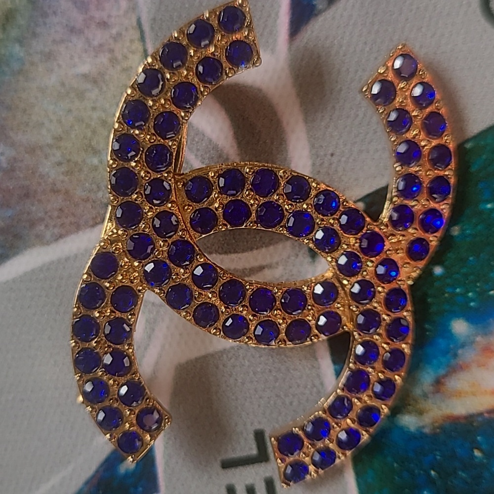 Goldtone Brooch with Dark Blue Gems